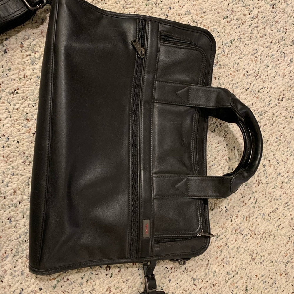 Tumi briefcase in a Napa black leather finish.